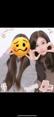 two girls are posing for a picture with a happy day sticker