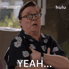 a man with glasses and a shirt that says mid century modern on it