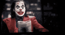 Joker Joker Read GIF - Joker Joker Read Joker Reading GIFs