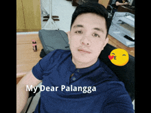 a man in a blue shirt is taking a selfie with the caption " my dear palangka " on the bottom