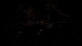 a blurred image of a person 's face with a red eye