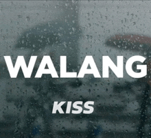 a sign that says walang kiss is on a window