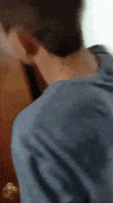 a close up of a person 's shoulder and neck