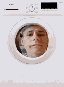 boy cleaning spinning washing machines