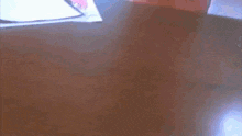 a blurred image of a person walking down a staircase