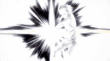 a silhouette of a person standing in front of a light beam .