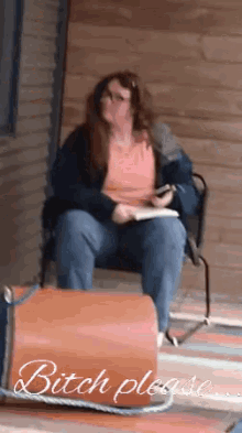 a woman sits in a chair with the words bitch please written on the bottom