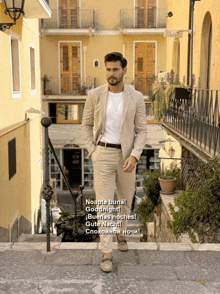 a man in a tan suit is standing on a set of stairs with the words goodnight written below him