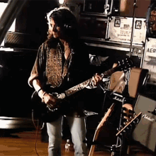 Playing The Guitar Aerosmith GIF - Playing The Guitar Aerosmith Eat The Rich Song GIFs