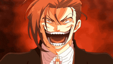 a man with red hair is making a funny face with his mouth open
