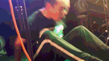 a blurry image of a person sitting on a chair