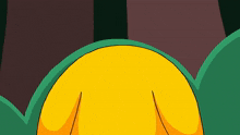 a close up of a yellow cartoon character 's butt with trees in the background