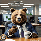 a bear in a suit and tie is sitting at a desk with a gm mug in front of him