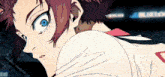 a close up of a person 's face with a blue eye and a red hair