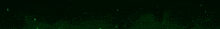 a close up of a green light beam on a black background