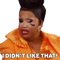a drag queen says " i did n't like that " while wearing an orange top