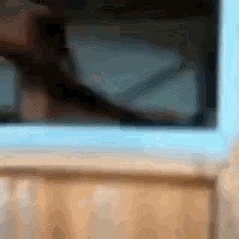 a blurry picture of a person taking a selfie