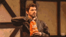 Eating Chips Hmm GIF - Eating Chips Hmm Unsure GIFs