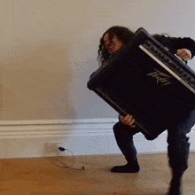Carry A Heavy Amplifier Bradley Hall GIF - Carry A Heavy Amplifier Bradley Hall Attempt To Transport An Amplifier GIFs