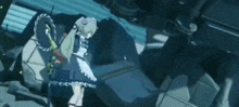 a girl in a maid outfit is standing next to a machine