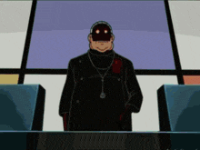 a man wearing a mask is standing in front of a desk .