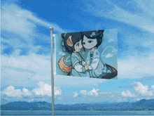 a flag with a picture of two girls on it is flying in the wind