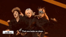 a group of women are dancing in front of a sign that says " bumsup 's choreography section "