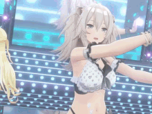 a girl in a bikini is dancing on stage