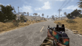 a person holding a rifle in a video game with a screen that says ' a few minutes ago ' on it