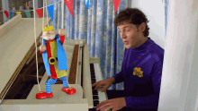 singing pupper sings piano musician artist