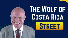 a man in a suit and tie is smiling in front of a blue background that says " the wolf of costa rica street "