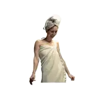 a woman wrapped in a white towel with a towel wrapped around her head .