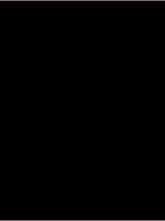 a person 's face is visible in a dark room with a red light behind them that says ' a ' on it