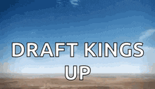 a sign that says draft kings up with a blue sky in the background