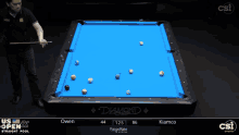 a pool table with a blue cloth and the name diamond on it