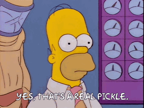 Homer Simpson's face turns red as he gently says "Yes, that's a real pickle.: