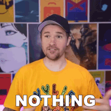 a man wearing a yellow t-shirt that says nothing