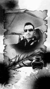 a black and white drawing of a man in a car with a feather and a bottle of ink