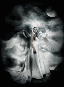 Lovely Angel GIF - Lovely Angel Wings GIFs