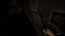a screenshot of a video game shows a skeleton in a cave