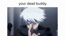 a man with white hair and blue eyes is holding his finger to his nose