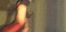 a close up of a person 's face with a blurred background .