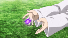 a person in a white shirt is holding a purple object in their hand