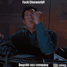 a man giving the middle finger with a caption that says fuck cineworld dogshit ass company