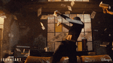 a woman is throwing money in the air in a disney + ad