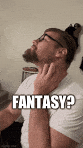 a man with glasses and a beard is scratching his neck with the words fantasy written above him