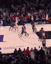 a basketball game is underway at crypto arena