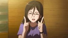 a girl wearing glasses is giving a thumbs up sign