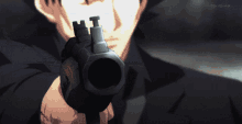 a man is pointing a gun with tokyo mx written on the bottom