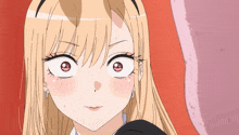 a close up of a blonde anime girl 's face with big eyes
